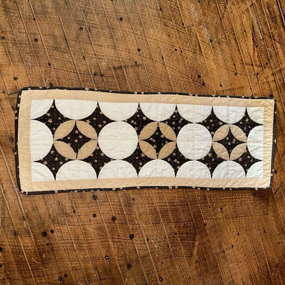 Handmade tan star pattern quilted table runner